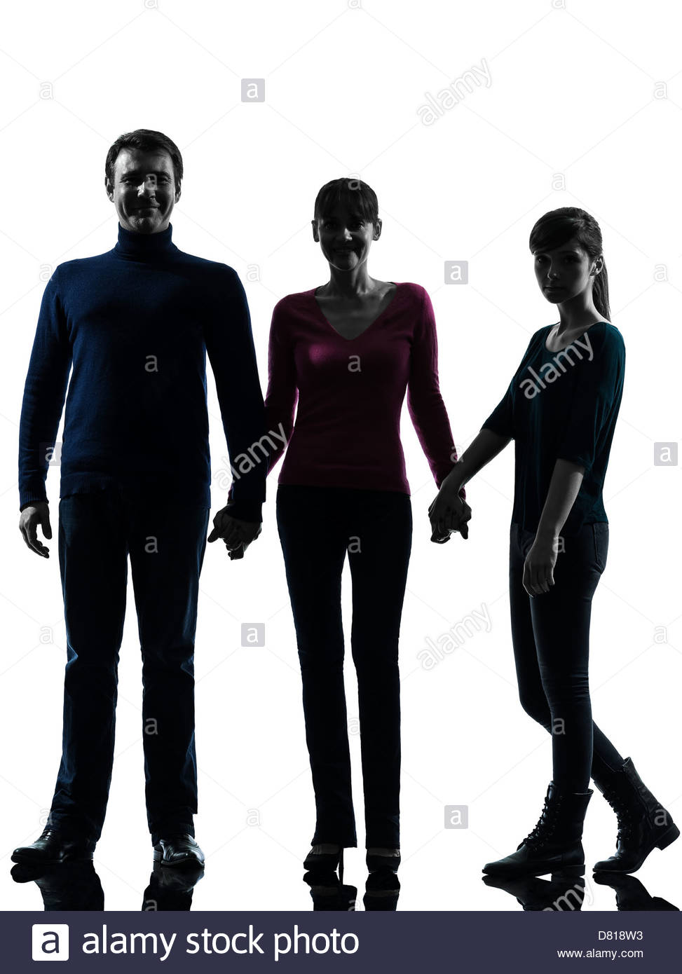 973x1390 One Family Father Mother Daughter Man Holding Hands In Silhouette