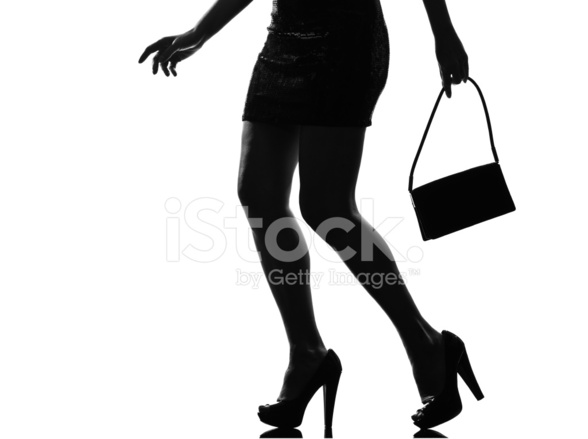 588x439 Stylish Silhouette Woman Legs Walking Stock Photos