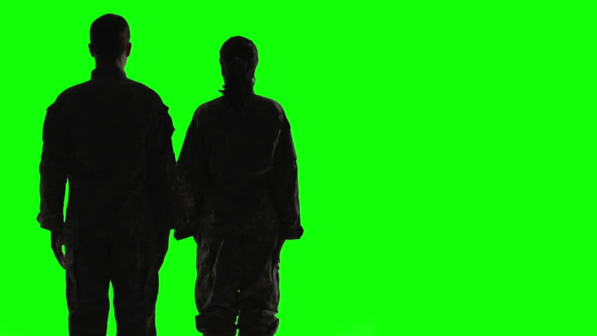 852x480 Male And Female Soldiers' Silhouettes In Front Of Green Screen