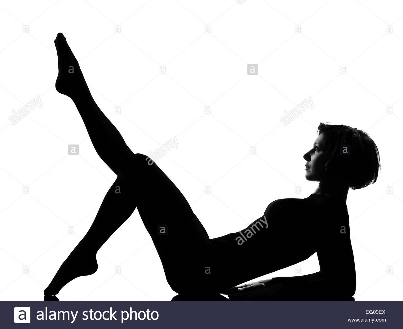 1300x1061 Woman Exercising Lying On Back Fitness Yoga Stretching In Shadow