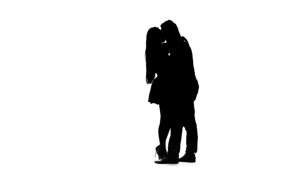 590x332 Guy And The Girl Are Kissing. Silhouette. White Background By
