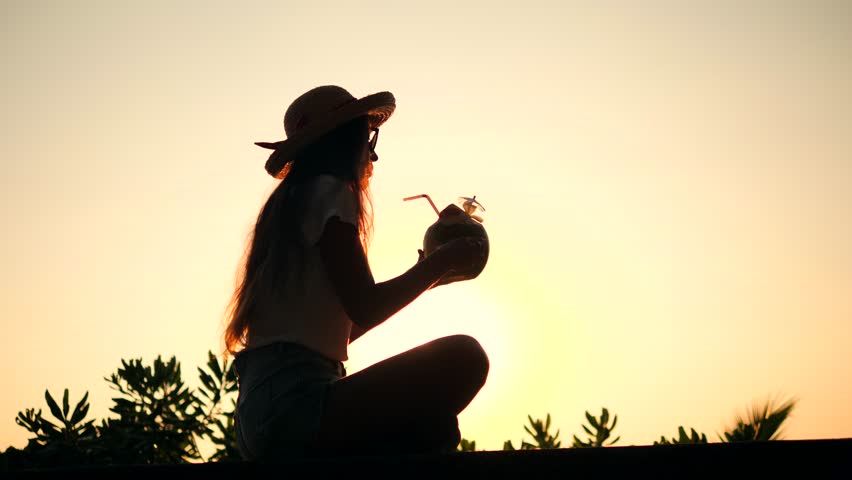 852x480 Attractive Young Tourist Hipster Girl Drinking Fresh Thai Coconut