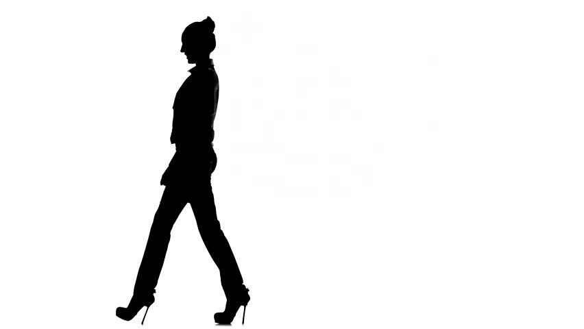 852x480 Silhouette Of A Young Attractive Woman Walking In The Street, Side