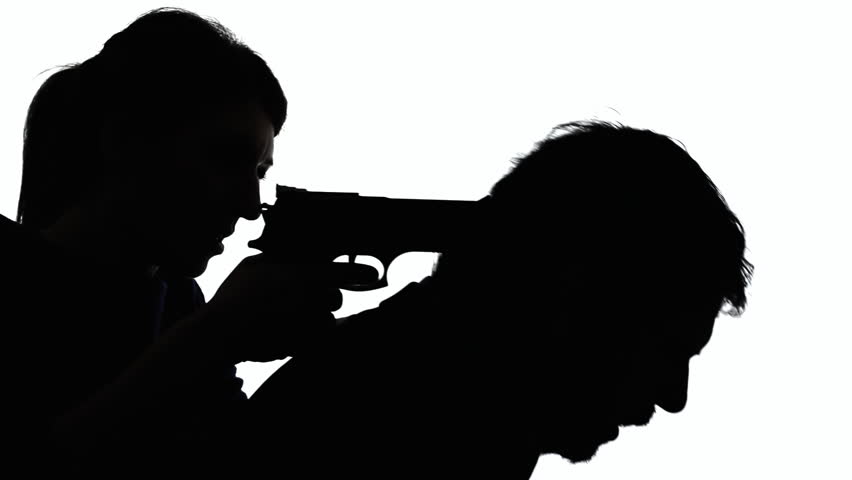 852x480 Silhouette Of A Man Smoking A Cigarette. He Takes A Drag, Then