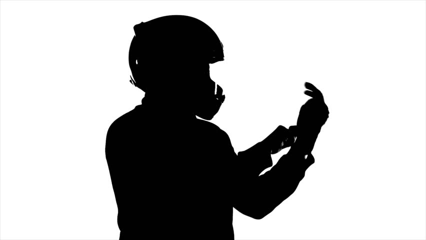 852x480 Man Wearing Helmet Puts On Gloves Stock Footage Video 1761632