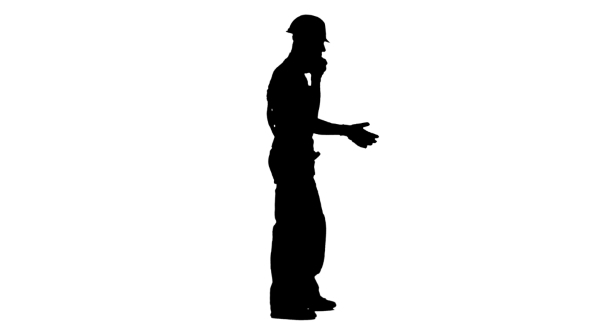590x332 Silhouette Of Foreman In Helmet And Gloves Speaks Phone