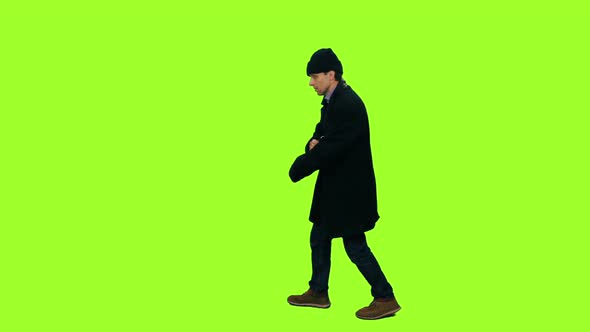 590x332 Homeless Man Walks On Green Background, Chroma Key By Mgpremier