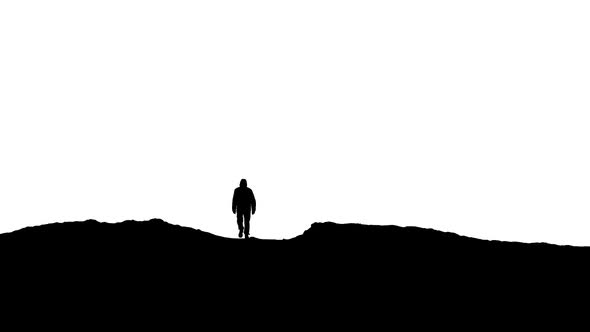 590x332 Man Walks Over Hill Silhouette By Rockfordmedia Videohive