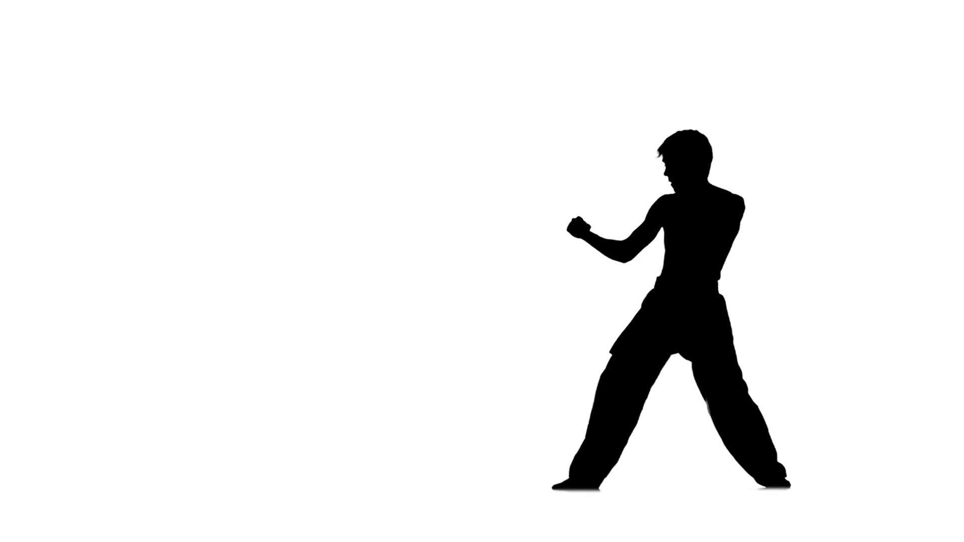 1920x1080 Man Training Taekwondo Or Karate In A Black Kimono On A White