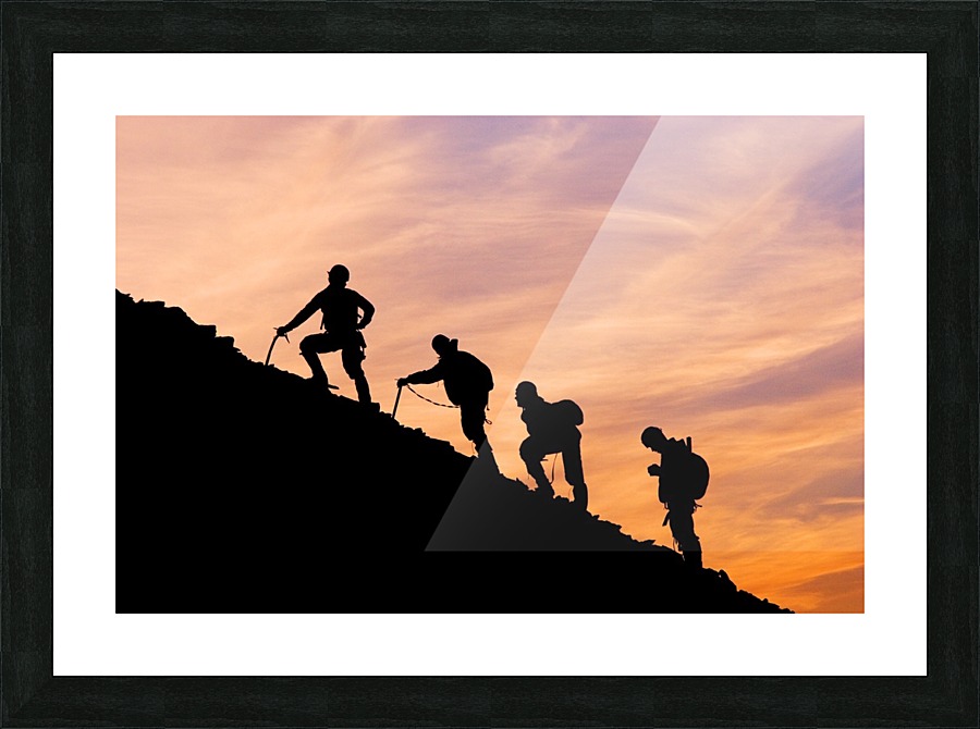 900x670 Silhouette Of Four Mountian Climbers As They Ascend Mount