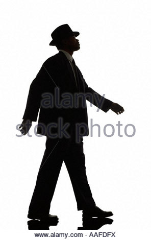 296x470 Silhouette Of Man With Hat Standing In Backlit Colonnade Showing