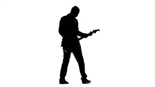 320x180 Silhouette Young Man Playing Guitar Stock Video Footage