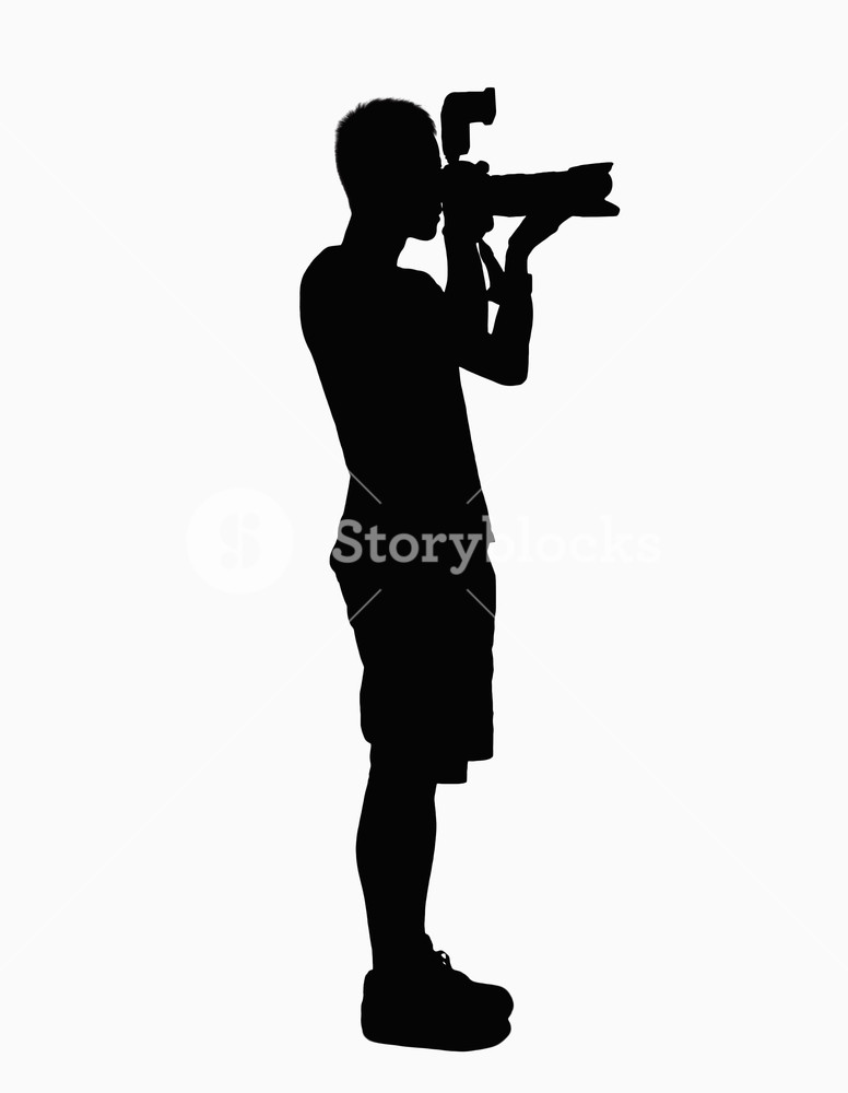 776x1000 Silhouette Of Man Holding Camera. Royalty Free Stock Image