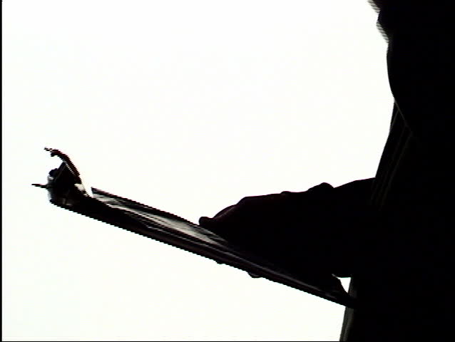 638x480 Silhouette Of A Doctor Sitting At A Table Against Window.