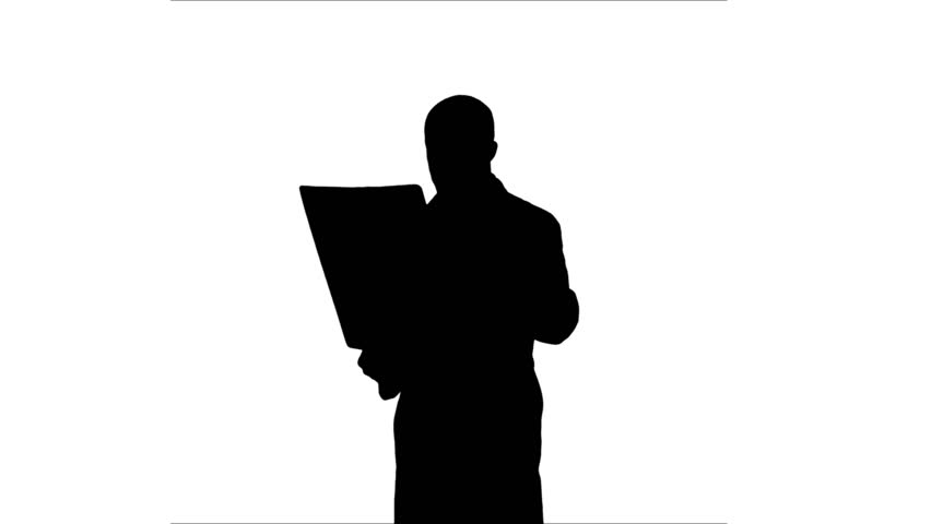 852x480 Silhouette Site Manager Talking On The Phone Holding Blueprints