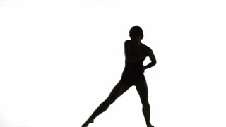 320x180 Silhouette Young Woman Doing A Modern Dance Piece In Front