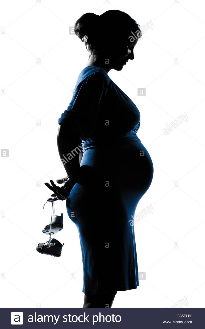 866x1390 Beautiful Caucasian Pregnant Woman Holding Baby Shoes