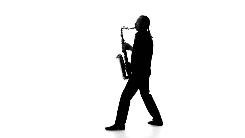 852x480 Dark Silhouette Of Musician Emotionally Plays The Saxophone On