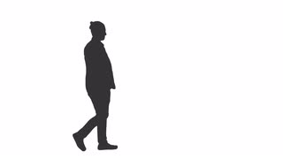 320x180 Silhouette Of A Young Man Walking With Hands In Pockets. Side View