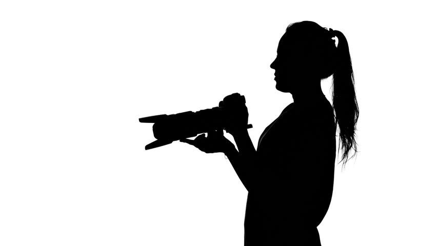 852x480 Studio Photography On A Professional Camera. White. Silhouette