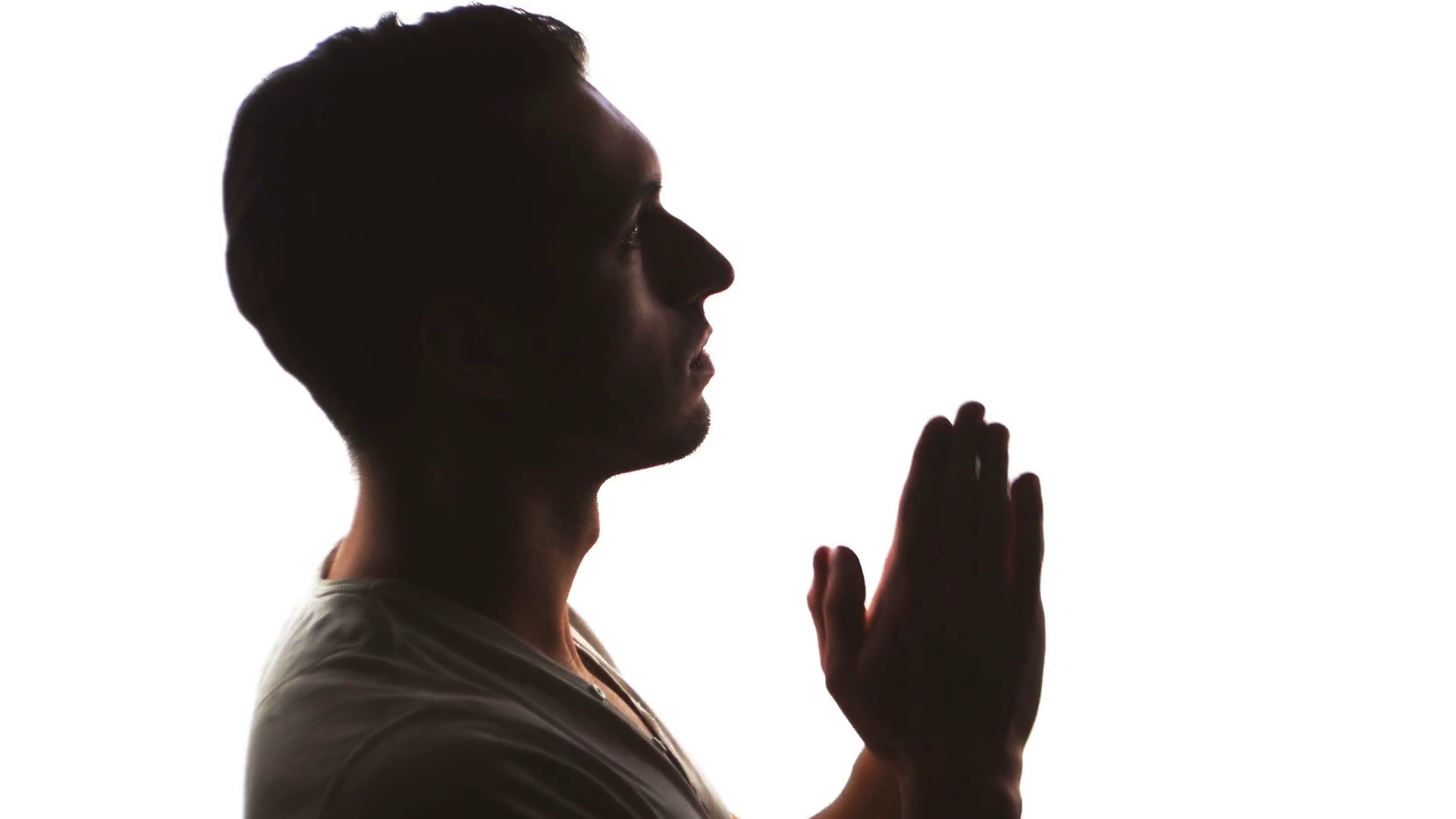 1920x1080 Silhouette Of A Man Hand Praying, Close Up Stock Video Footage