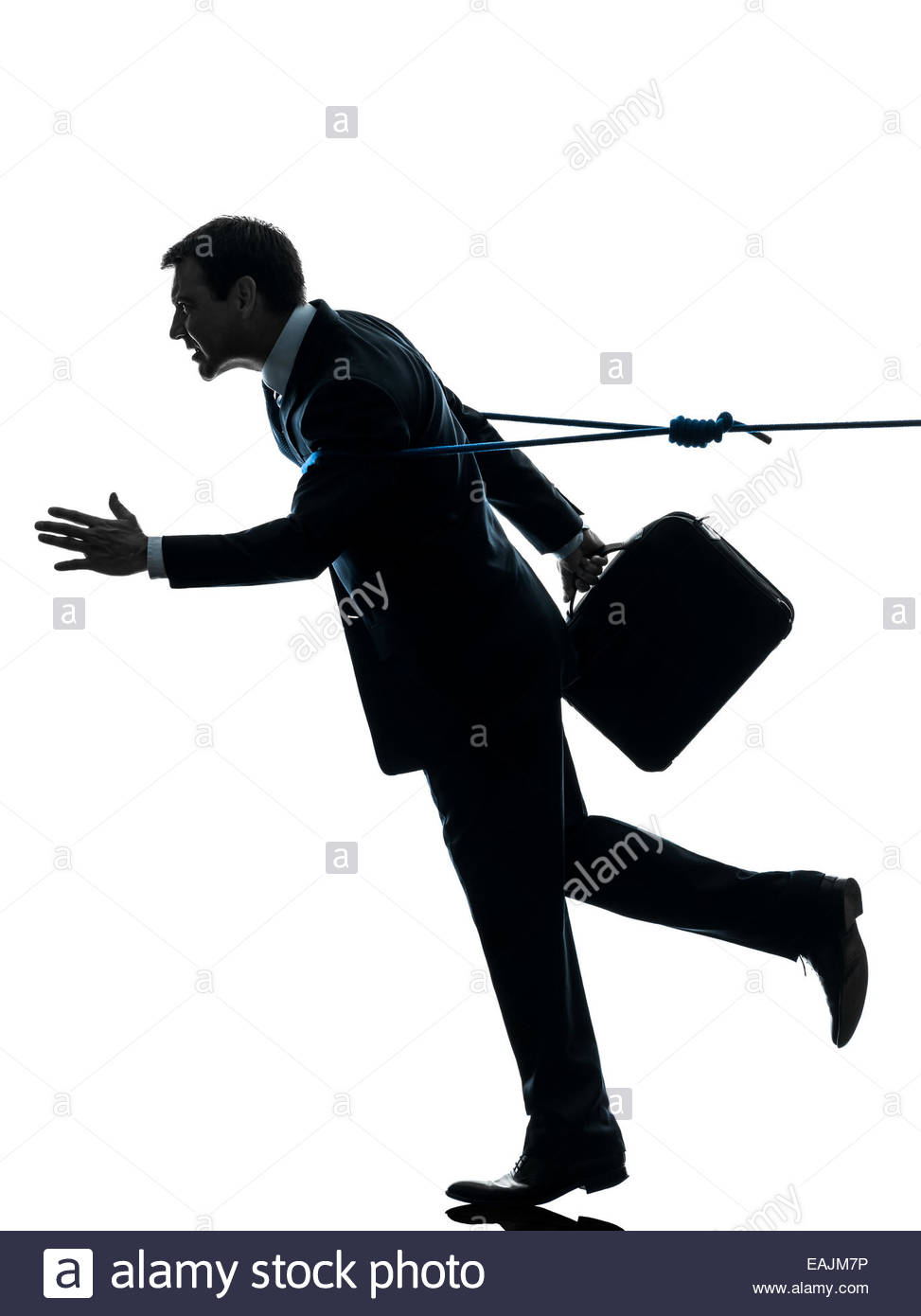 973x1390 One Business Man Catched By Lasso Rope In Silhouette Studio