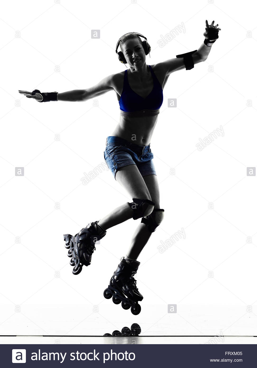 973x1390 One Woman In Roller Skates Silhouette Studio Isolated On White