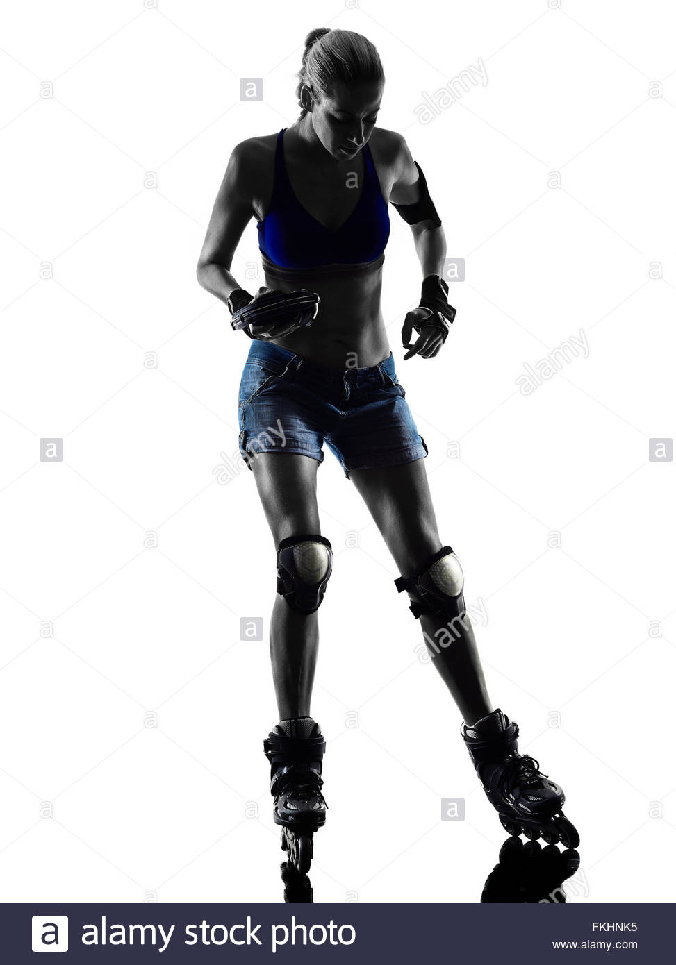 973x1390 One Woman In Roller Skates Silhouette Studio Isolated On White
