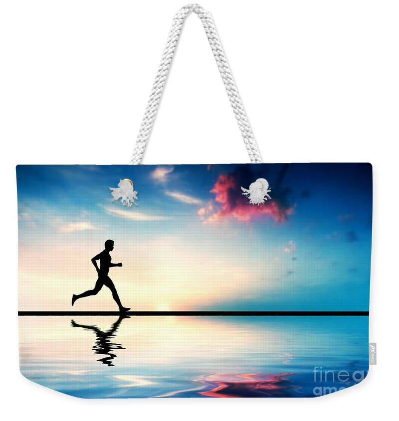 800x845 Silhouette Of Man Running At Sunset Weekender Tote Bag For Sale By