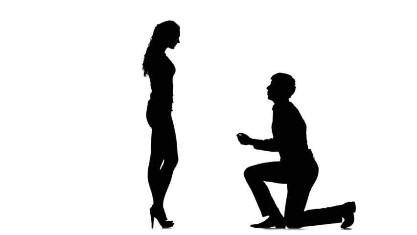 852x480 Silhouette Of Man On One Knee And Kissing Woman's Hand. In Full