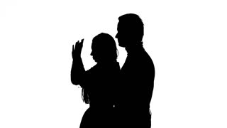 320x180 Silhouette Of A Loving Couple Kissing On Top Of A Hill In