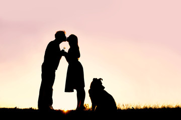 360x240 Silhouette Of Loving Young Couple Kissing Under Tree