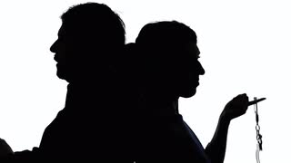 320x180 Silhouette Detective Couple Gun Handcuffs. Two Detectives (A Man