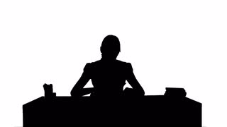 320x180 Female Silhouette Reading A Book Stock Video Footage