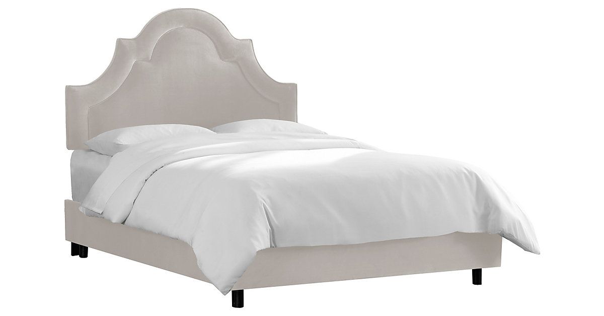 1200x627 Soft, Velvety Upholstery Covers This Bed's Beautifully Arched