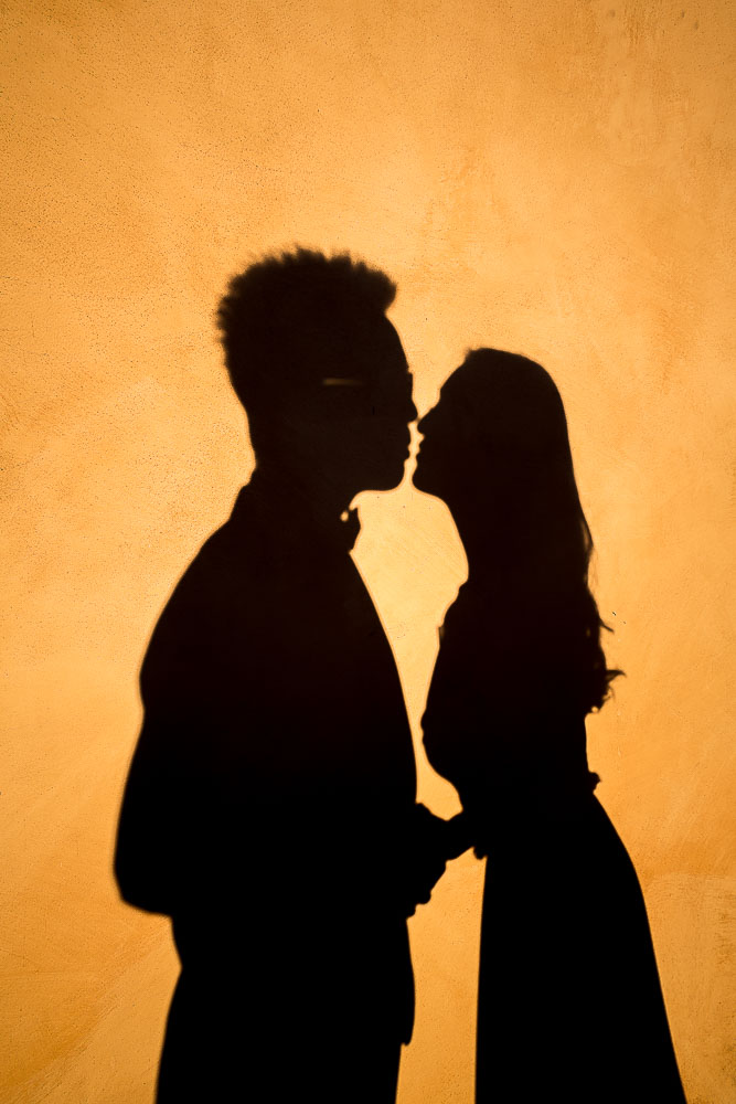 Silhouette Of A Couple Kissing