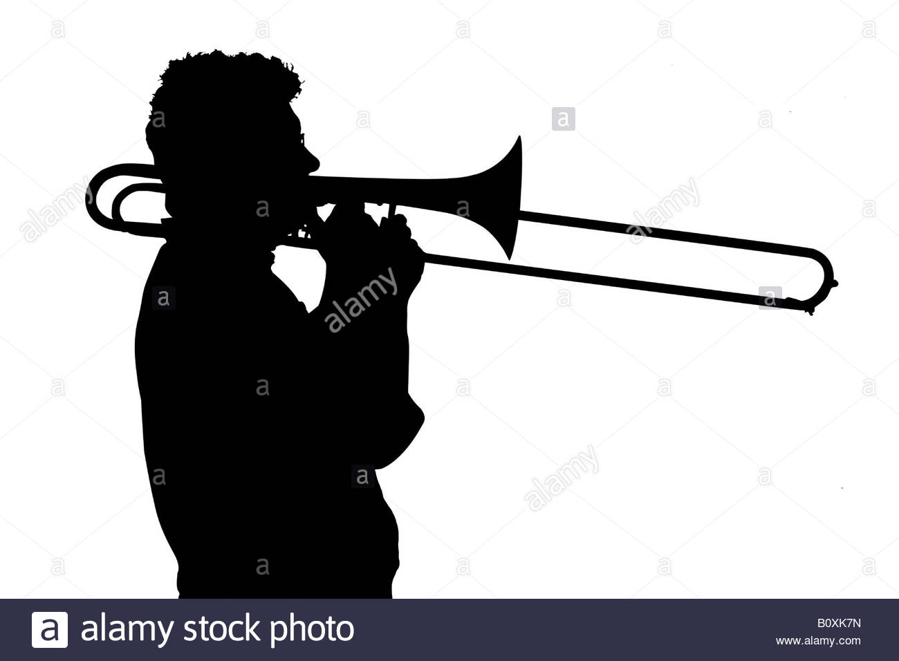 1300x956 Silhouette Of A Man Playing The Trombone Stock Photo 17796233