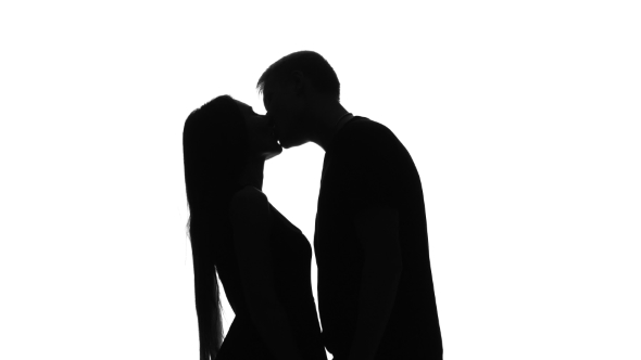 590x332 Real Feelings Of Love, Two Lovers Kissing. Silhouette. White By