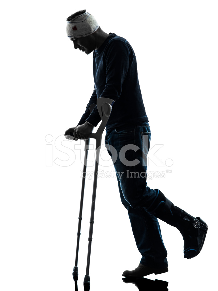 765x1024 Injured Man Walking Sad With Crutches Silhouette Stock Photos