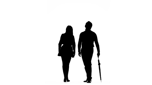 590x332 Guy And The Girl Are Kissing Under The Umbrella. Silhouette. White