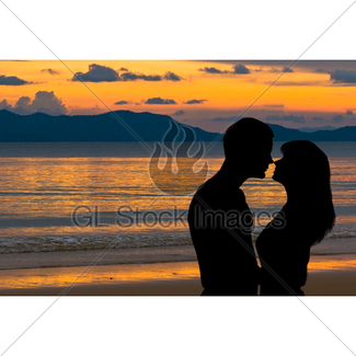325x325 Silhouette Of Couple On The Beach At Sunset Gl Stock Images