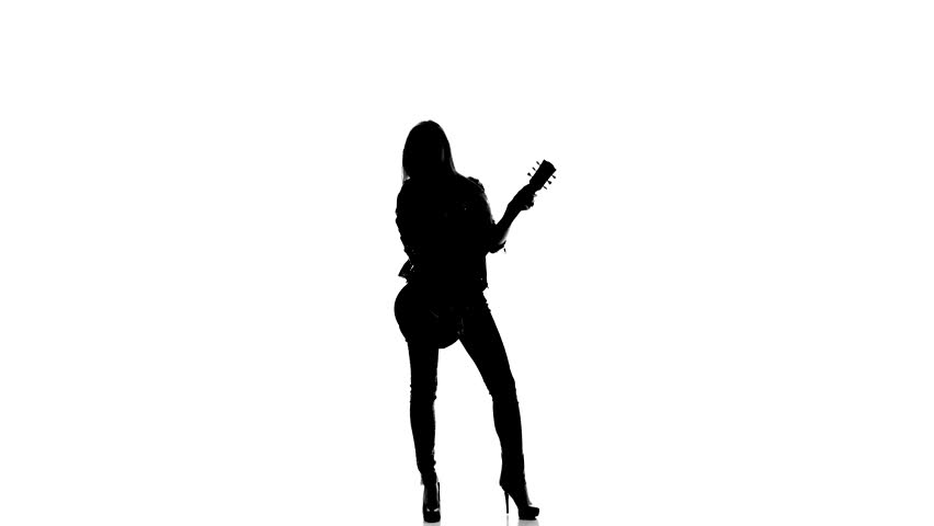 852x480 Silhouette Of A Young Girl Dancing With Electric Guitar On A White