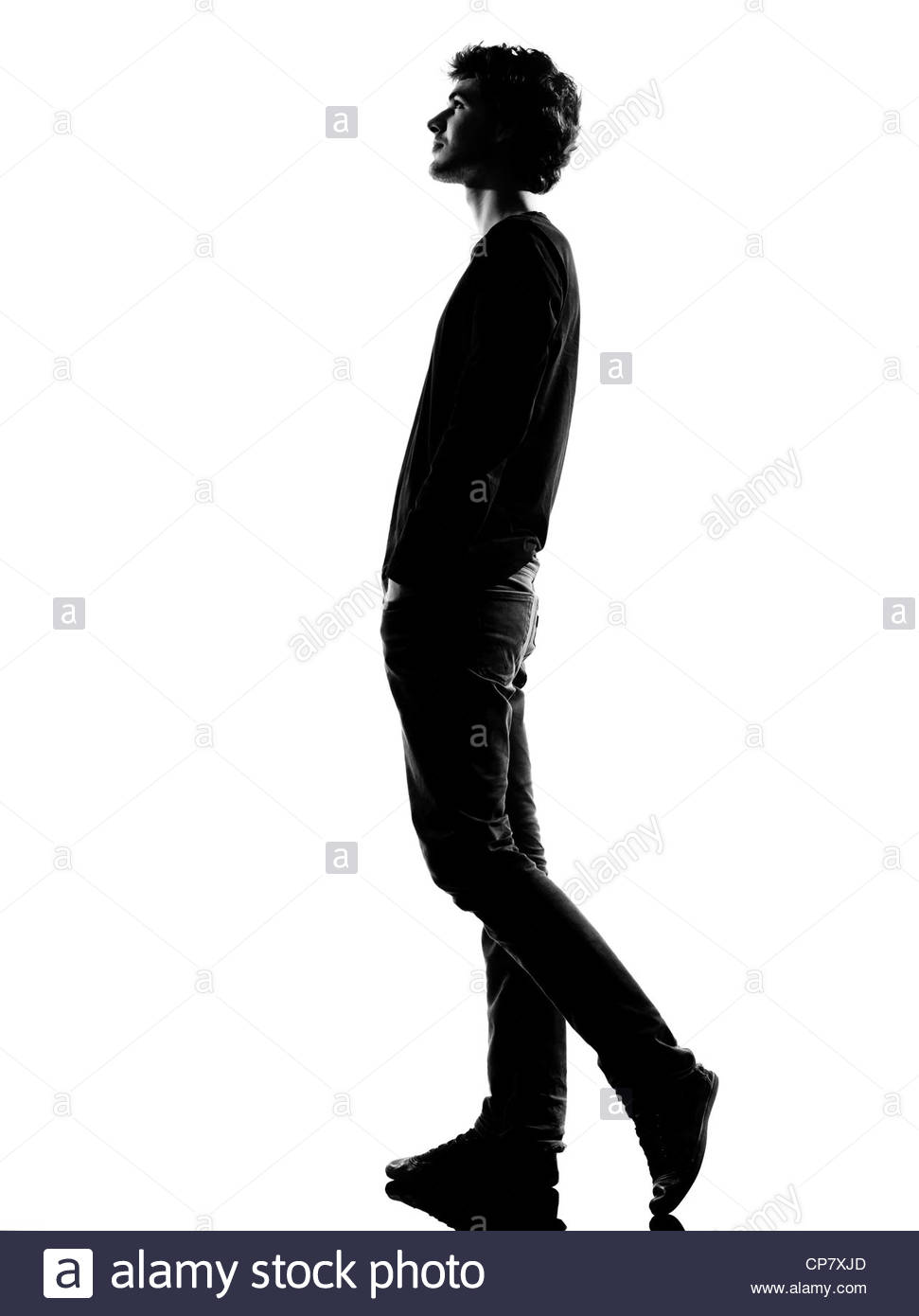 971x1390 Young Man Walking Silhouette In Studio Isolated On White