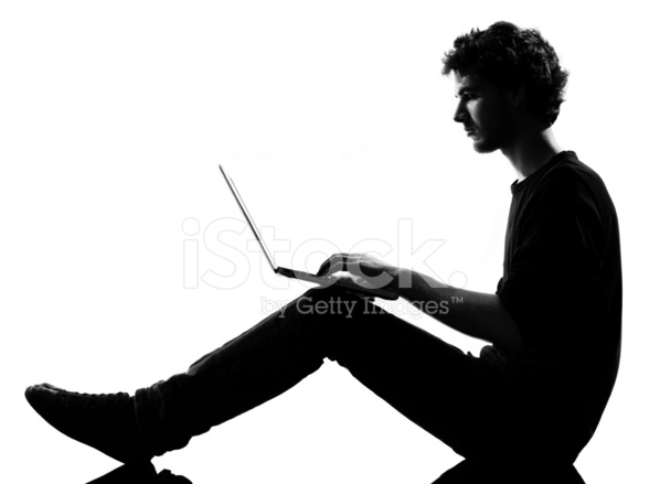 588x439 Young Man Silhouette Sitting Computing Laptop Stock Photos