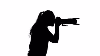 320x180 Black On White Silhouette Of A Photographer With High Speed