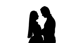320x180 Portrait Of Two People Kissing. Silhouette. White Stock Video