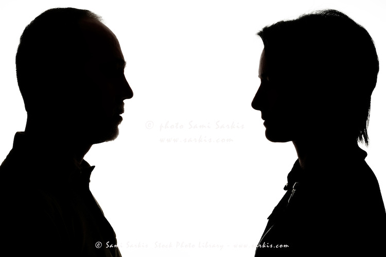 750x500 Silhouette Of Man And Woman Face To Face Sami Sarkis Stock Photo