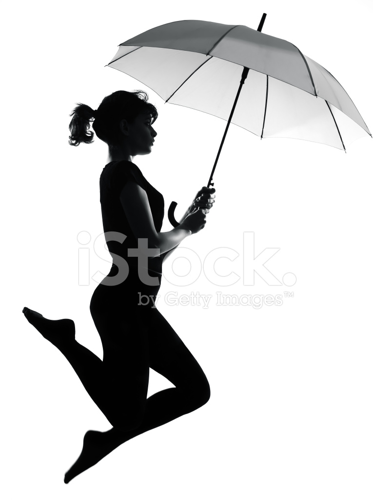 765x1024 Silhouette Woman Flying Holding Open Umbrella Stock Photos