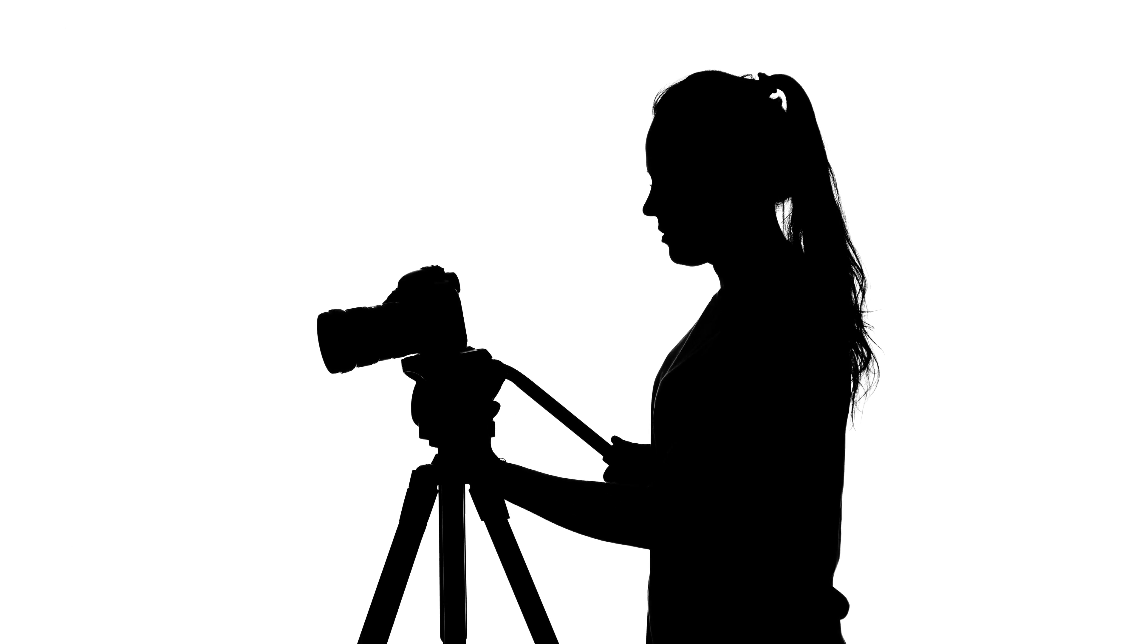 3840x2160 Photographer Works With A Tripod. White. Silhouette Stock Video