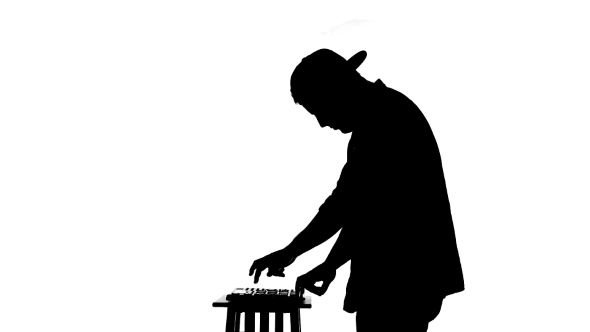590x332 Black Silhouette Of A Dj Playing A Mixer On A By Lovevision